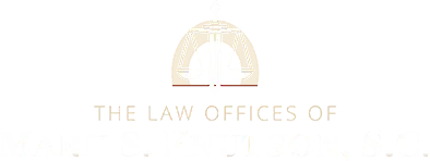 Logo featuring balanced scales of justice above the text "The Law Offices of" and a blurred law firm name.