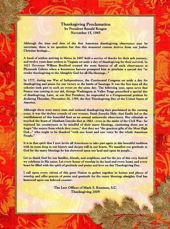 Thanksgiving Proclamation text by President Ronald Reagan on parchment with red and gold decorative border.